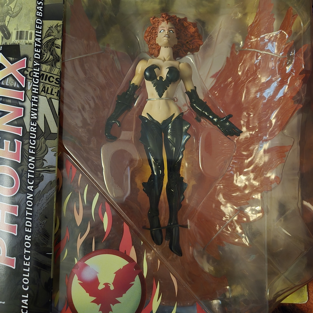 Phoenix Action Figure with Red Hair and Black Outfit